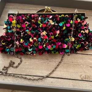 Fun clutch sequin bag with shoulder strap.